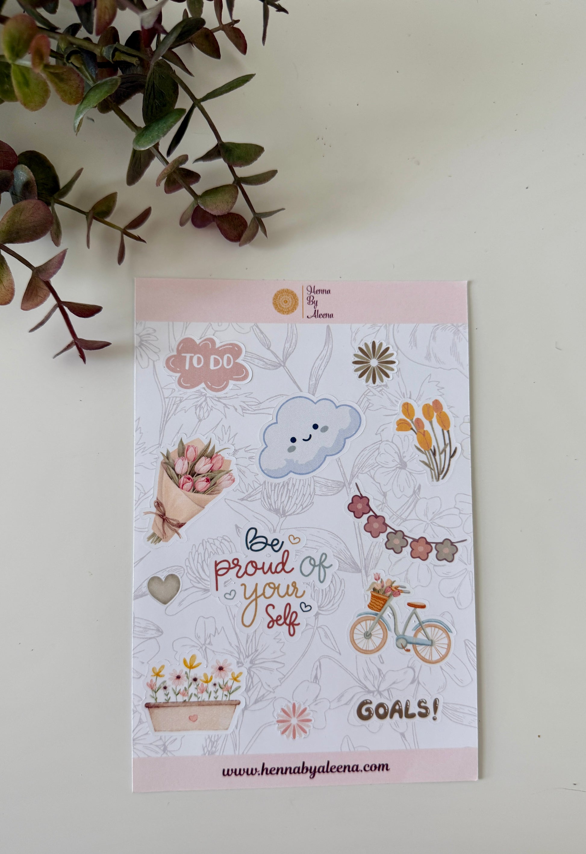 Decorative planner sticker sheet with illustrations and text on a white background